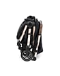 1102672631_2025_maxicosi_stroller_Eva3_essentialblackchampagne_onehandflashfold_side