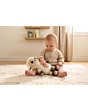 3333131061_2026_TinyLove_PlushSheepSnugglyBuddy_FarmersFunday_LifestyletImage_babysittinglivingroom